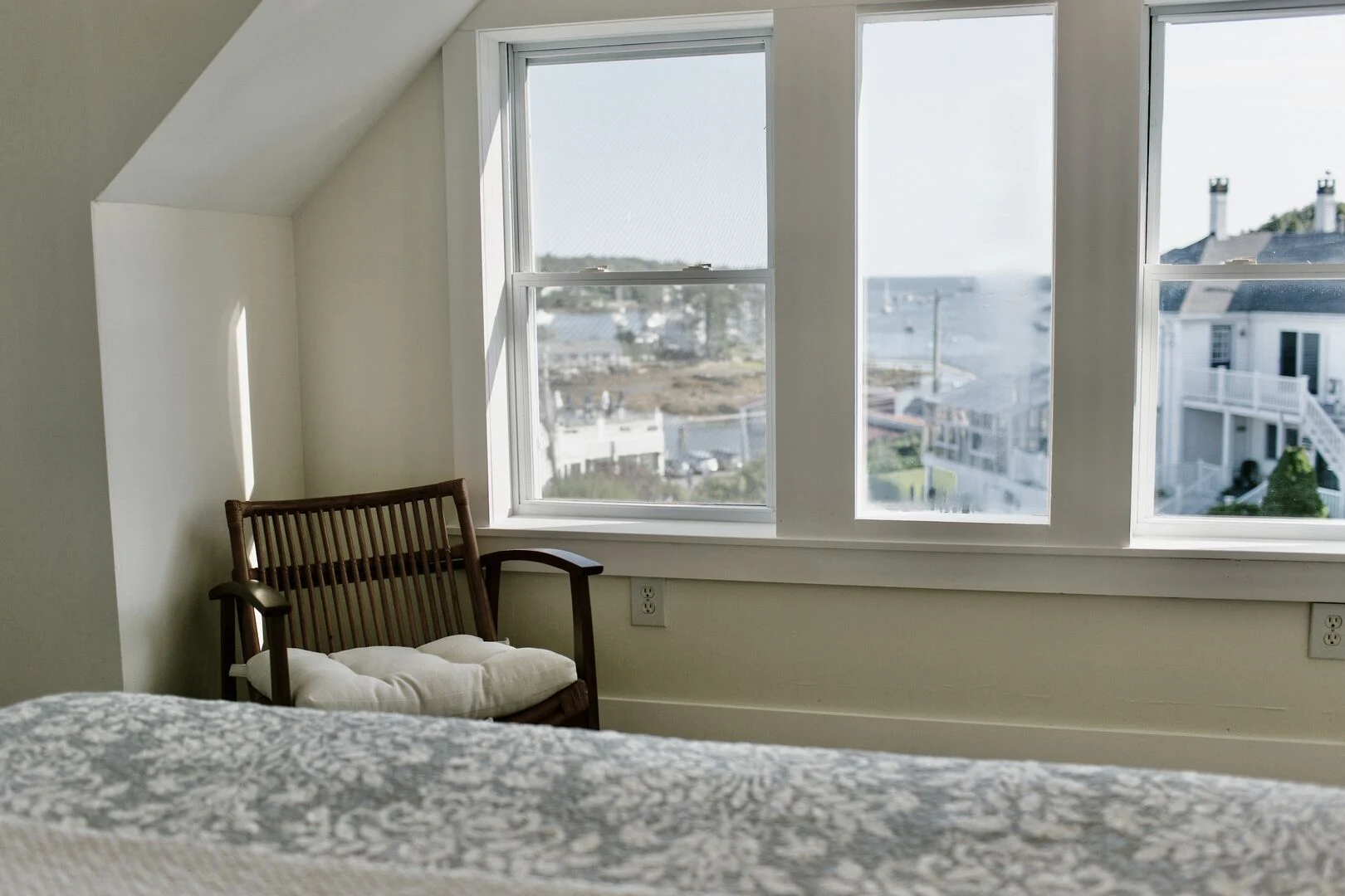 Boothbay Harbor Inn Room With Scenic Harbor View | Late-Summer Weekend Escape Maine Cozy inn bedroom with stunning Boothbay Harbor view on a late-summer morning